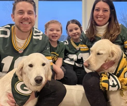 Dr. Alex Coffman with family and dogs